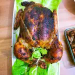 A roast chicken with bread stuffing.