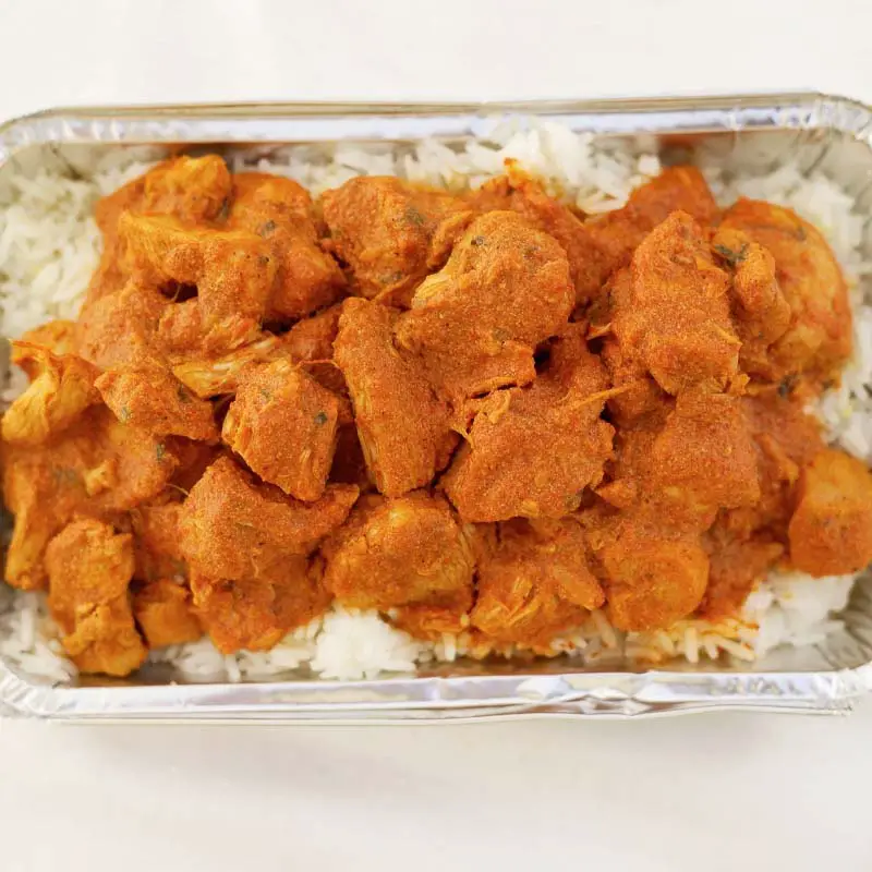 Indian Curry plated over steamed rice.