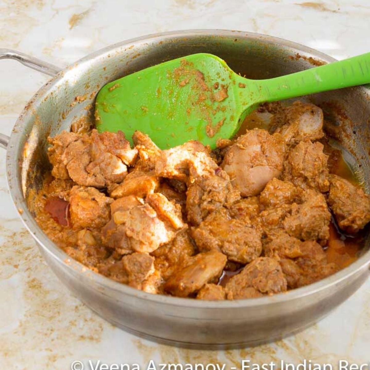 A pan with chicken curry.