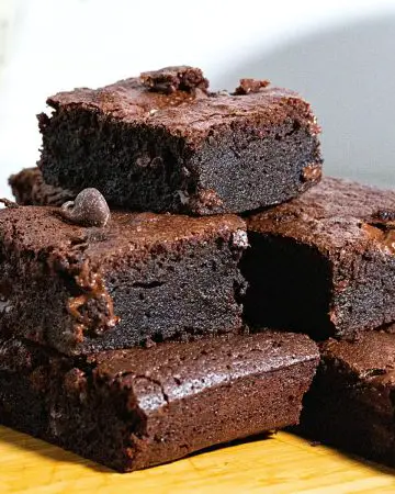 Stack of chocolate brownie squares.