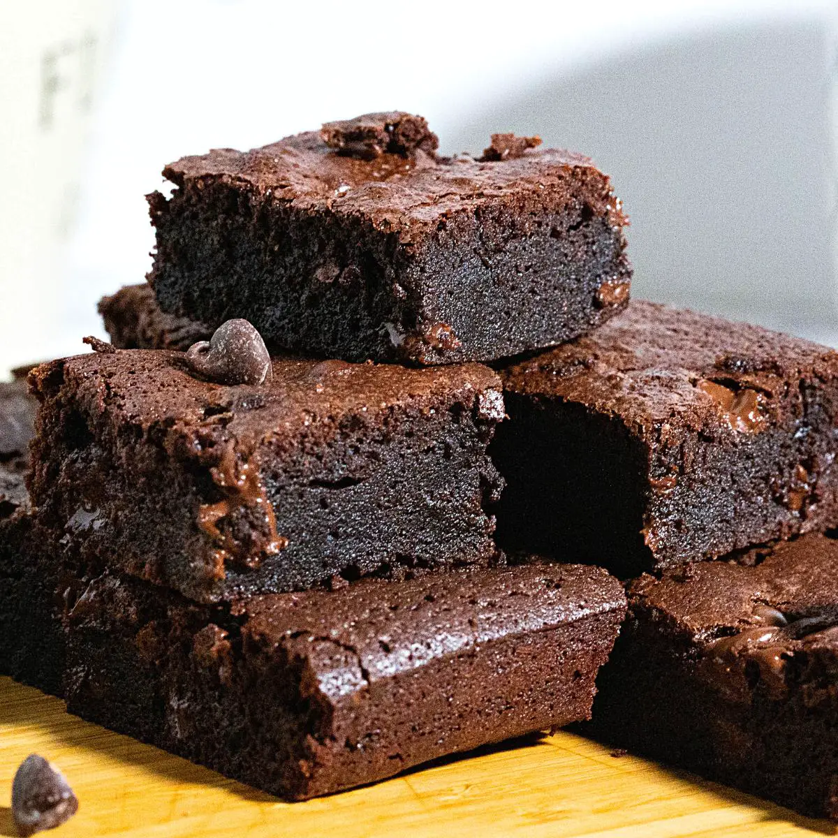 Stack of chocolate brownie squares.