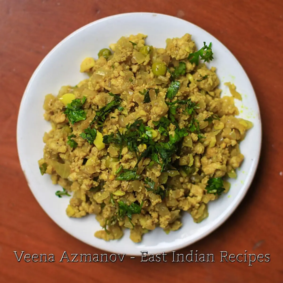 Ground chicken with Indian spices on a plate.