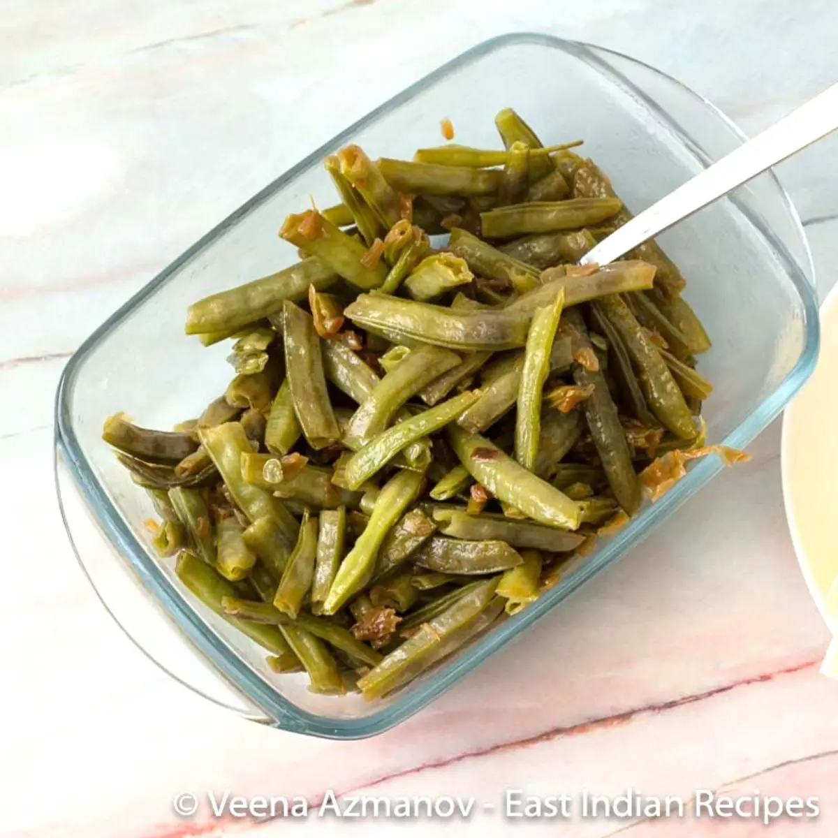 Sauteed beans in a bowl.