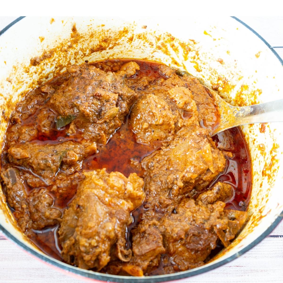 Mutton coconut curry in dutch oven.