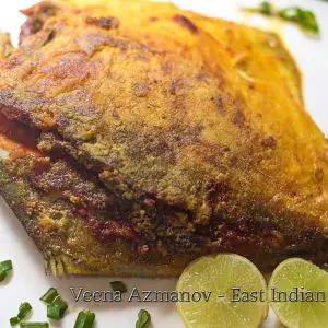 A fried pomfret with green masala stuffing.