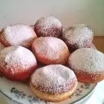 Jam doughnuts on a platter