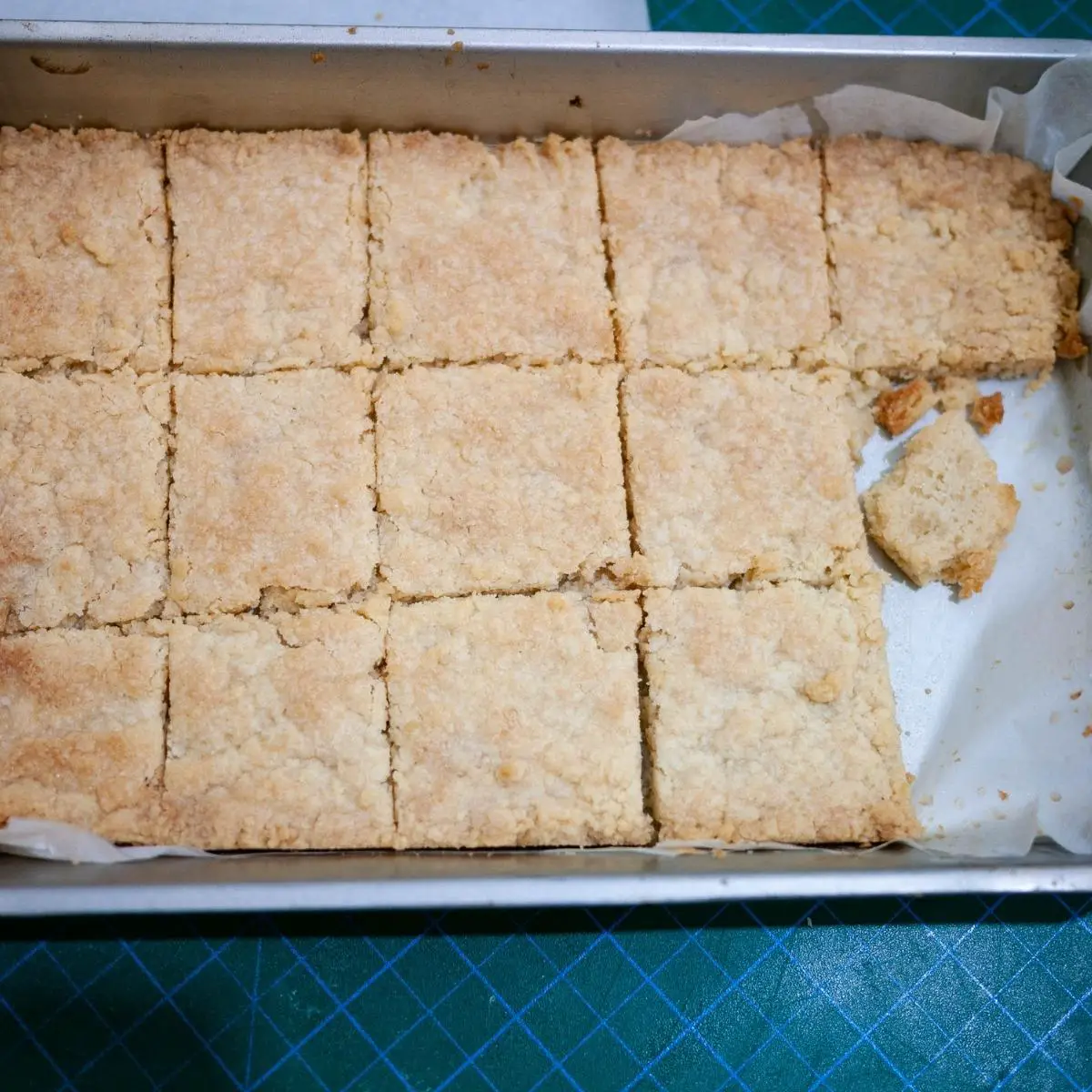 A baking tray with baked shortbread.
