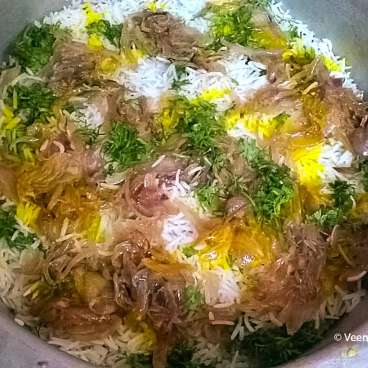 Biryani recipe with mutton on a plate.