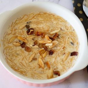 Vermicelli pudding in a bowl with nuts.