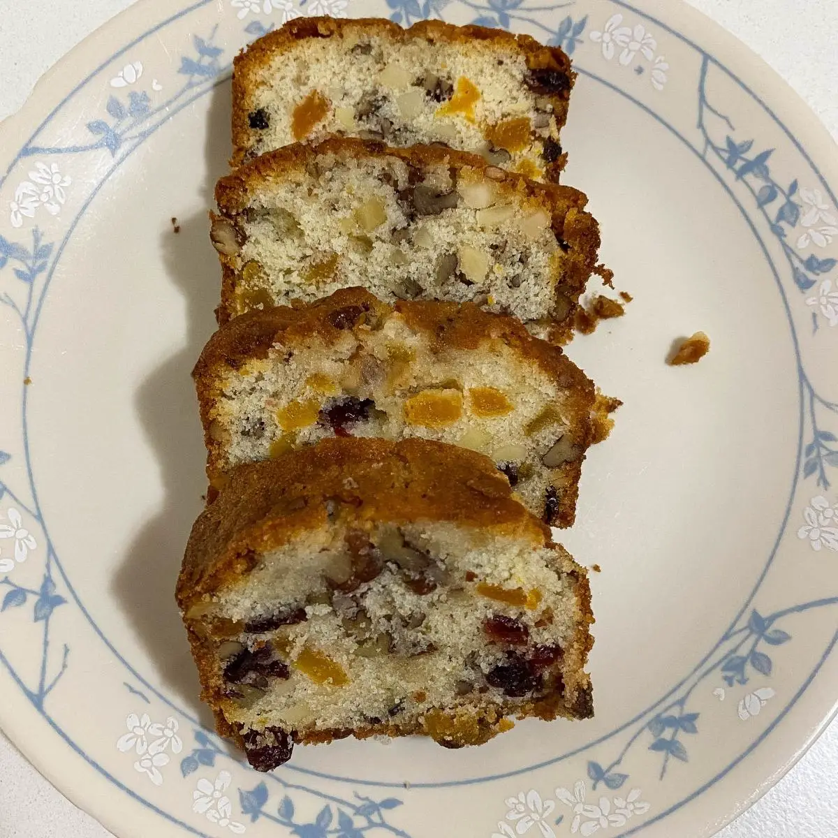 A marzipan fruitcake on the plate.