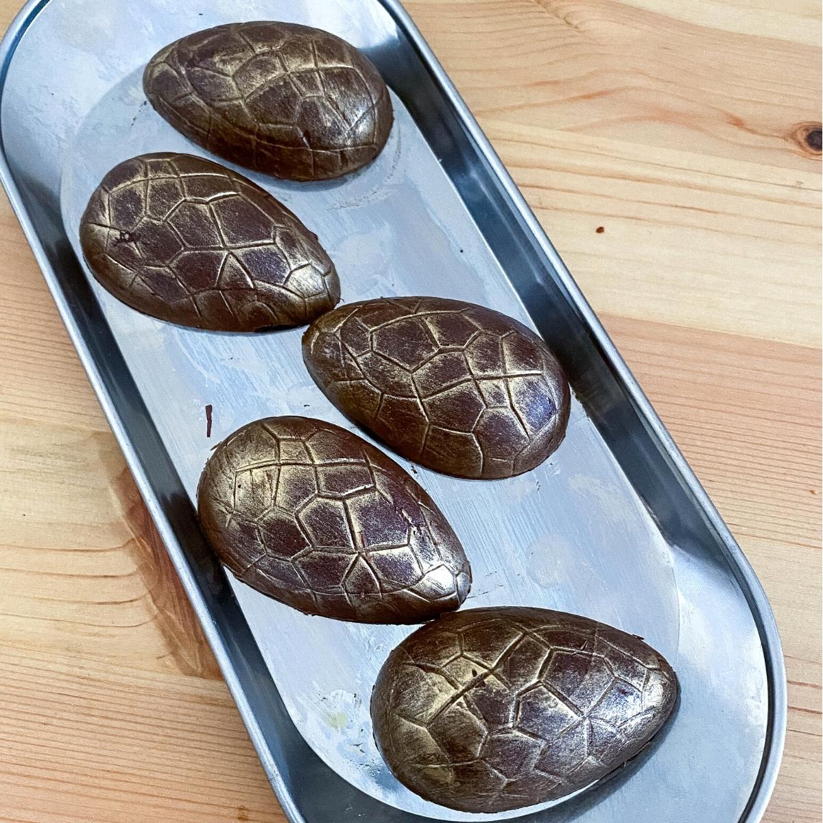 A tray with chocolate eggs,