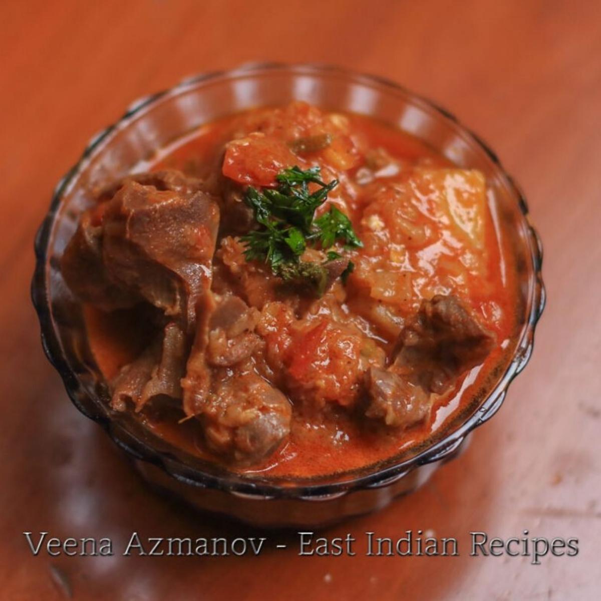 A bowl with East Indian Chicken curry.