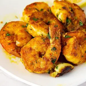 Shrimp pan fried on the table.