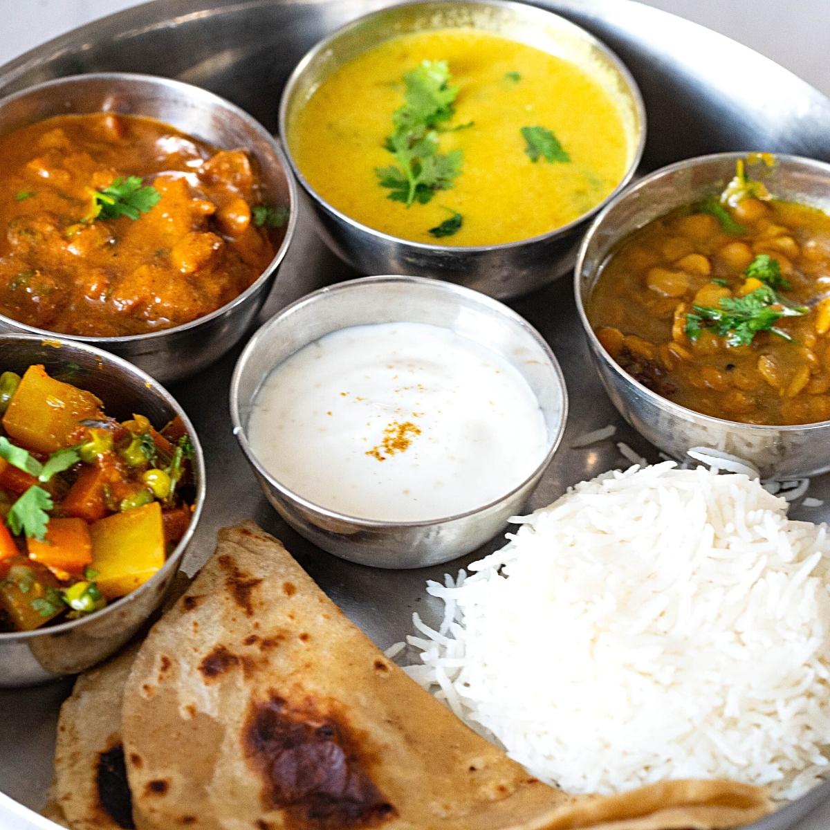 A thali with vegetarian dishes.