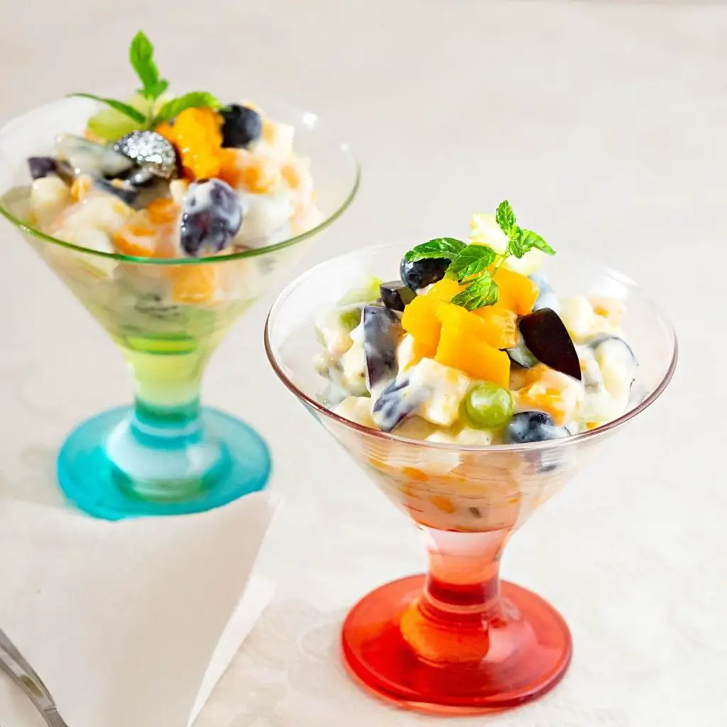 Glass bowls with fruit salad.
