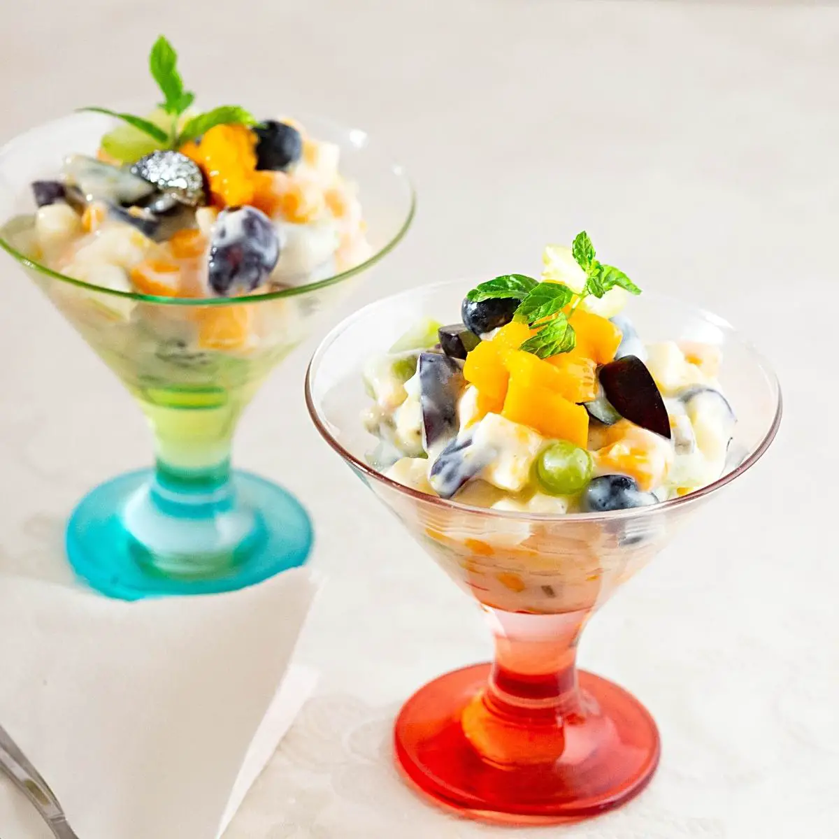 Glass bowls with fruit salad. 