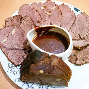 Sliced roast beef on the plate.