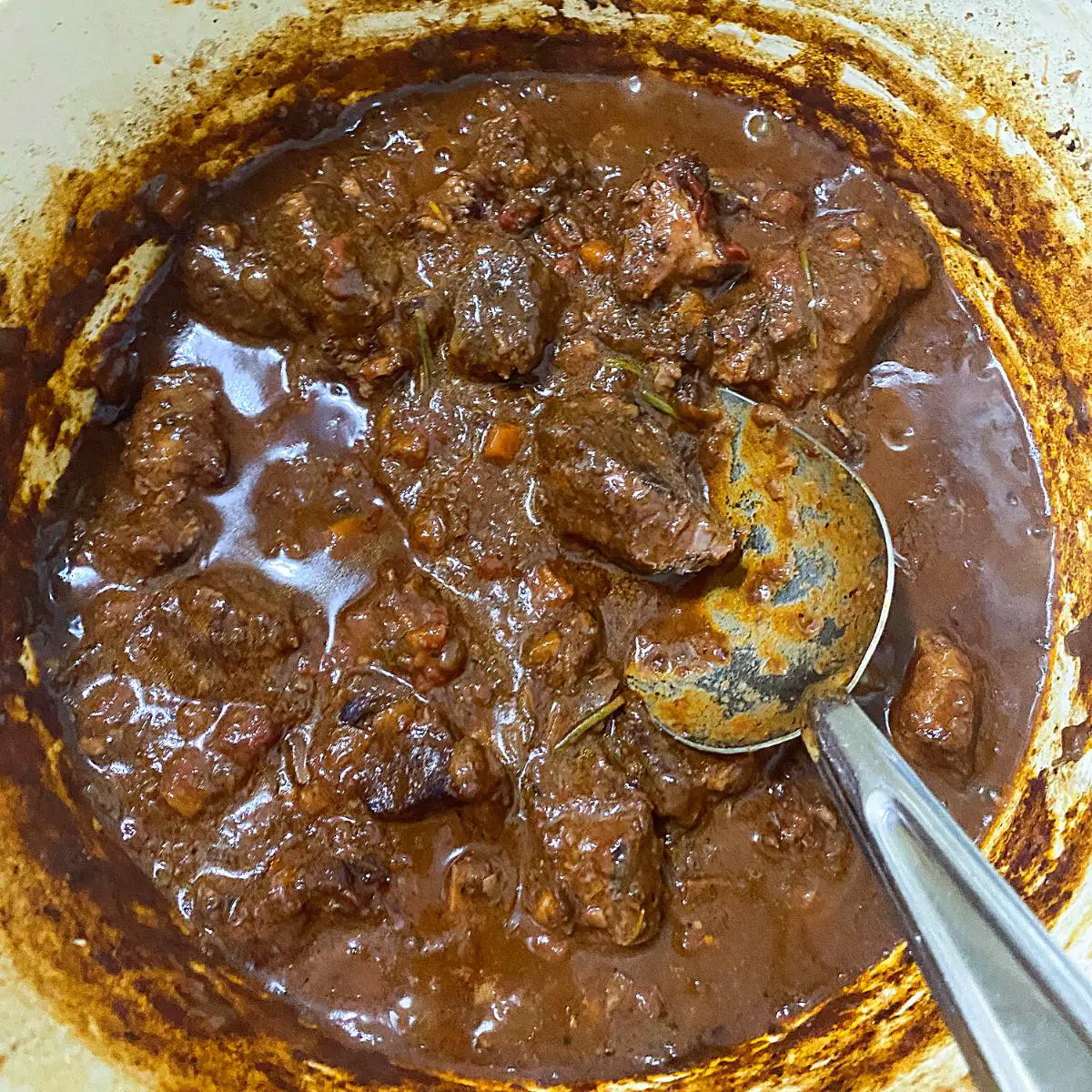 A Goan mutton curry in the pot.