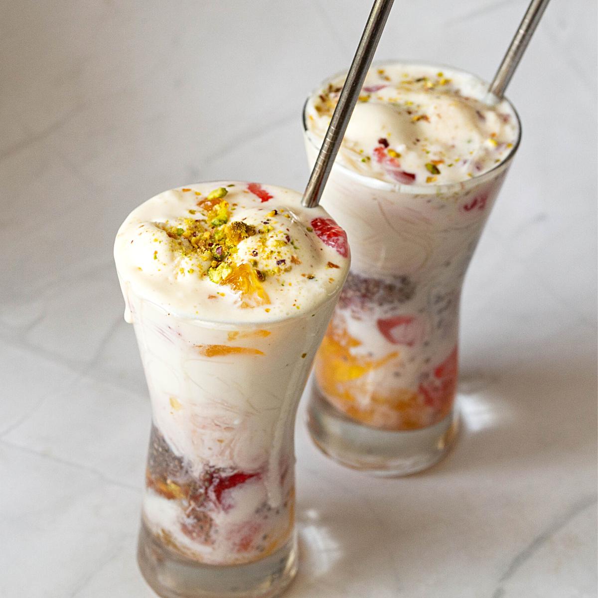 Two tall glasses with falooda.