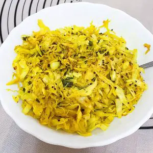 A bowl with sauteed cabbage.