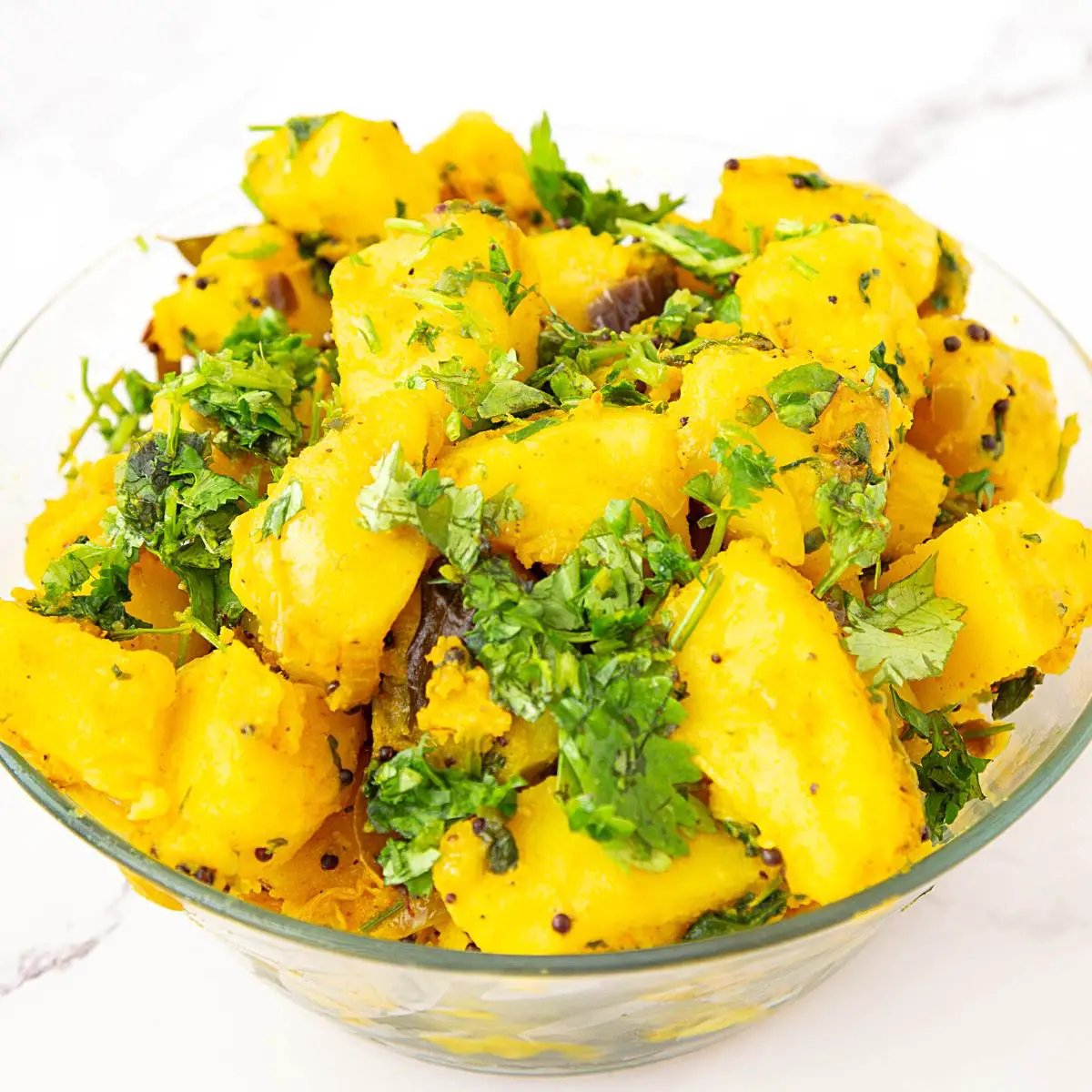 A bowl with aloo masala Indian recipe.