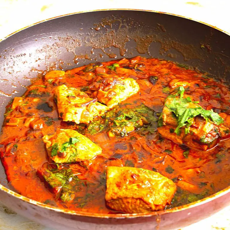 Skillet with fish curry.